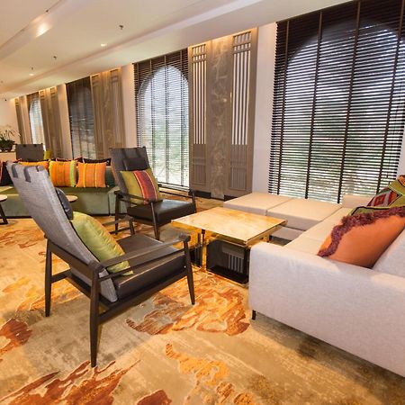 The Heritage Chiang Rai Hotel And Convention Экстерьер фото The lounge at the airport