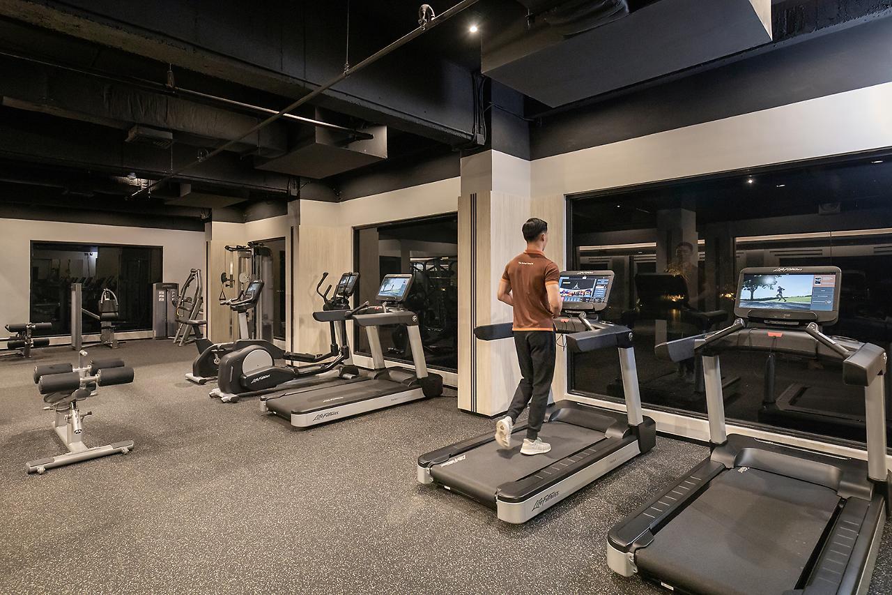 The Heritage Chiang Rai Hotel And Convention Экстерьер фото The gym at the hotel